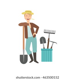 Guy Leaning On Spade With Bucket Of Other Farm Equipment Behind
