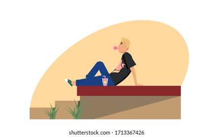 a guy leisuring in front of his house after working