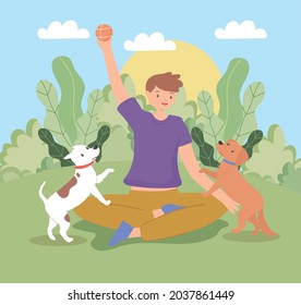 guy with pets playing on the grass