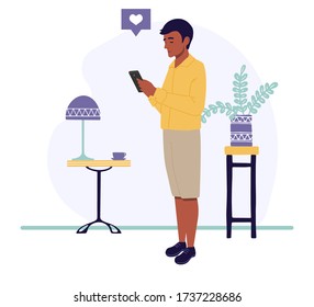 El tipo con el teléfono aislado en un fondo blanco en un estilo plano. Un hombre mira el teléfono. Ilustración vectorial.