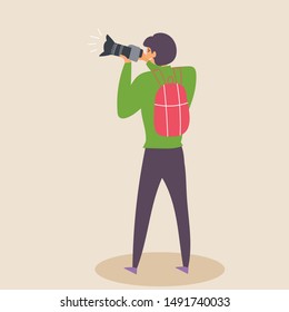 The guy photographs with a SLR camera in a natural environment. Photographer. Editable Vector Illustration