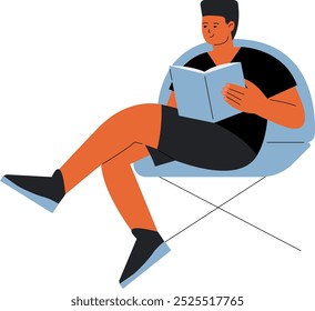 Guy read in chair. Cozy home leisure time