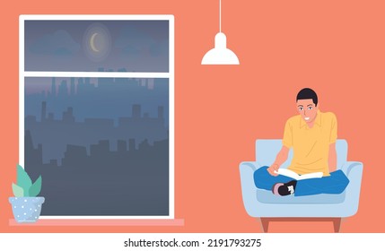El tipo está leyendo un libro en casa. Sofá y ventana, relajación.