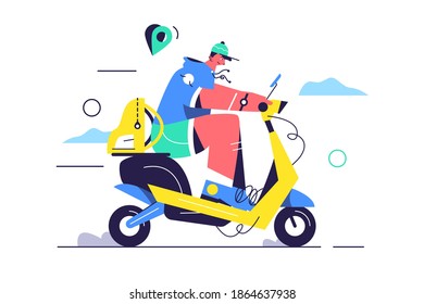 Guy rides an electric scooter down the street