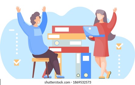 Guy is sitting near a stack of folders and joyfully raised his hands up. Girl with laptop talking to man. Couple communicating working together. People spend time in the office or library with books