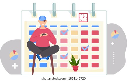 Guy is sitting on the chair with a gamepad in his hands. Office work management. Man is playing with joystick on console. Timetable or a calendar on the background. Boy is playing a video games