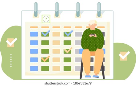 Guy is sitting on the chair with a gamepad in his hands. Teenager is playing with joystick on console. Timetable or a calendar on the background. Boy is playing a video games near schedule on the wall