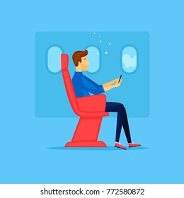 Guy is sitting on the plane. Flat design vector illustration.