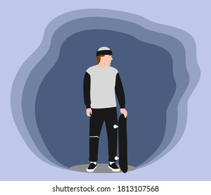 Ein Mann steht und hält ein Skateboard