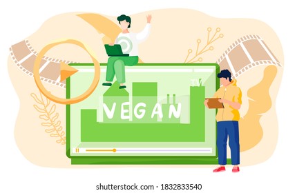Guy stands with tablet and communicates at a distance, man sits on the monitor with a laptop and working or studying online. Green tablet screen with inscription Vegan. Freelancer typing on laptop