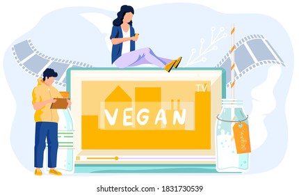Guy stands with tablet and works or studies at a distance, girl sits on the monitor with a phone in her hands and communicates at a distance. Tablet screen with inscription. Vegan milk in bottle