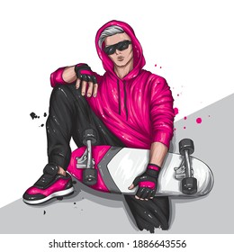 A guy in a stylish hoodie, shorts and sneakers with a skateboard. Sports, clothing and accessories.
