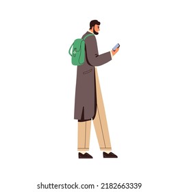 Guy Uses Smartphone On The Go. Man Walking, Holding Mobile Phone In Hand, Surfing Internet. Young Person With Cellphone In Arm On Street. Flat Vector Illustration Isolated On White Background