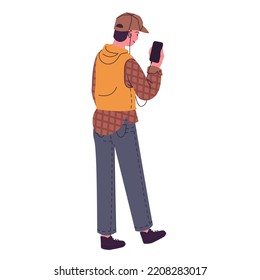 Guy walking in the street and listening to music