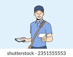 Guy works as postman and with smile holds out envelope with letter to screen, offering to use delivery correspondence. Man in postman clothes makes career in courier service or national postal company