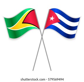 Guyanese and Cuban crossed flags. Guyana combined with Cuba isolated on white. Language learning, international business or travel concept.