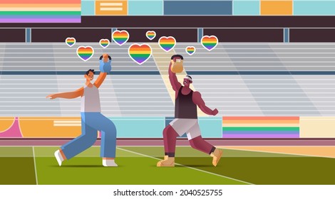 guys lovers doing physical exercises with dumbbells on stadium gays love parade transgender LGBT concept