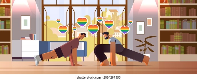 guys lovers doing physical exercises gay love parade transgender LGBT concept living room interior horizontal