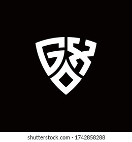 GX monogram logo with modern shield style design template isolated on black background