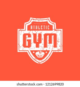 Gym club emblem for t-shirt. Graphic design with vintage texture. White print on red background