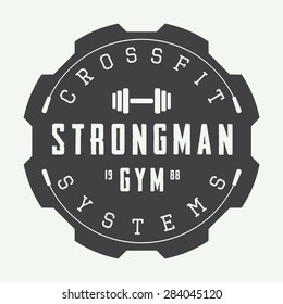 Gym Logo In Vintage Style. Vector Illustration. 