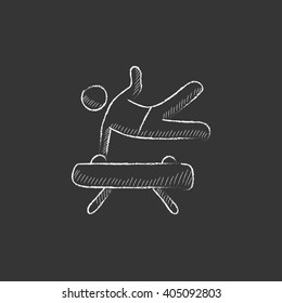 Gymnast exercising on pommel horse. Drawn in chalk icon.