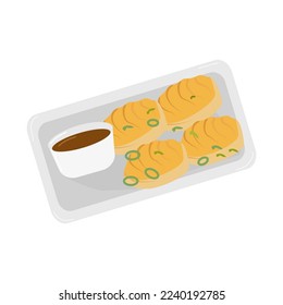 Gyoza pies with soy sauce decorated with green onions on a rectangular plate on a white background