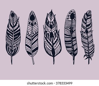 Gypsy love, hand drawn vector feathers for your design. Boho style. Hippie and tribal sketched elements.