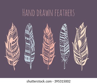 Gypsy love, hand drawn vector feathers for your design. Boho style. Hippie and tribal sketched elements.