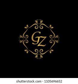 GZ Initial logo. Ornament ampersand monogram golden logo black background