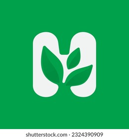 H letter eco logo with green leaves. Negative space agriculture icon. Lush foliage emblem. Vector template for seeds growing company, summer posters, waste recycling identity, nature friendly labels.