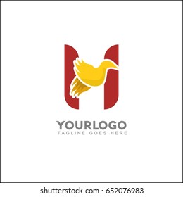 H letter elegant wing flying gold office logo. Abstract bird vector identity design template. Exclusive business company brand icon.