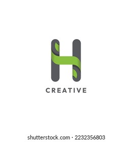 H letter with green leaves logo design