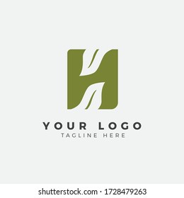 H Letra LOGO con logotipo de espacio negativo en hoja simple y logotipo MODERNO