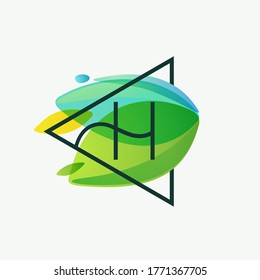 H letter logo in triangle frame at green leaves watercolor background. Vector ecology typeface for botanical labels, landscape headlines, recycle posters, organic cards etc.
