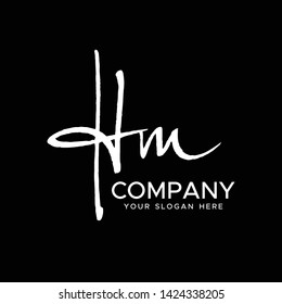 H M Initial Letter handwriting logo vector. Hand lettering for designs