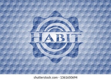 Habit blue badge with geometric pattern.