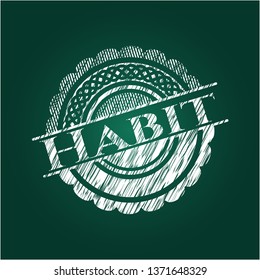 Habit written on a chalkboard
