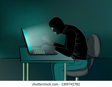 hacker in black clothes sitting at the laptops in the room