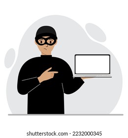 Hacker in a black mask with a computer. The cybercriminal is holding a laptop. Cyber attack, mobile phishing, scam. Vector flat illustration