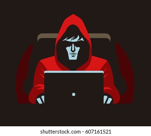 hacker stalker using a computer in the darkness