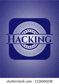 Hacking badge with denim background