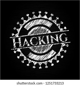 Hacking written on a chalkboard