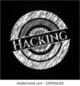 Hacking written on a chalkboard
