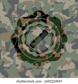 hair comb icon on camo texture