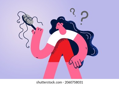 Hair loss and balding concept. Young stressed woman cartoon character standing looking at hairbrush with much hair left on it vector illustration 