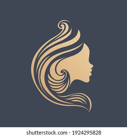 Hair salon logo.Long, wavy hairstyle woman.Profile view portrait.Hairdresser icon.Elegant style.Young lady face isolated on dark background.Beauty studio.Golden color.