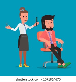 Hairdresser cuts the client's hair