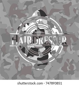 Hairdresser on grey camo texture