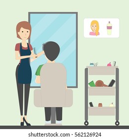 Hairdressing in salon. Female hairdresser makes hairdo to a man in chair. Fashion and spa. Salon interior.